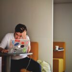 Confused and annoyed man in front of computer