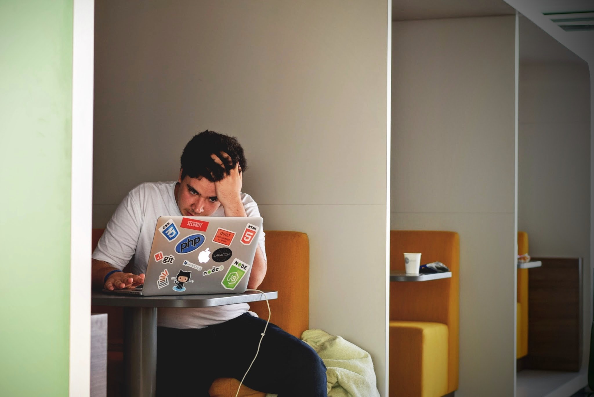 Confused and annoyed man in front of computer