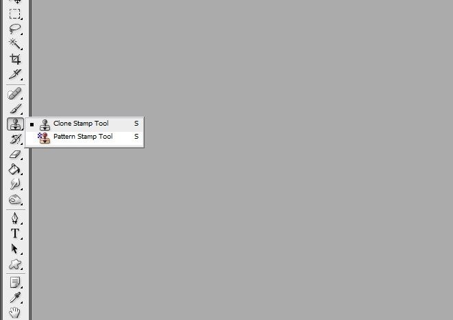 Selecting the Clone Stamp Tool in Photoshop's Toolbar