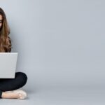 Woman thoughtfully considering career options, symbolizing the benefit of a christian career assessment tool in providing clarity and direction.