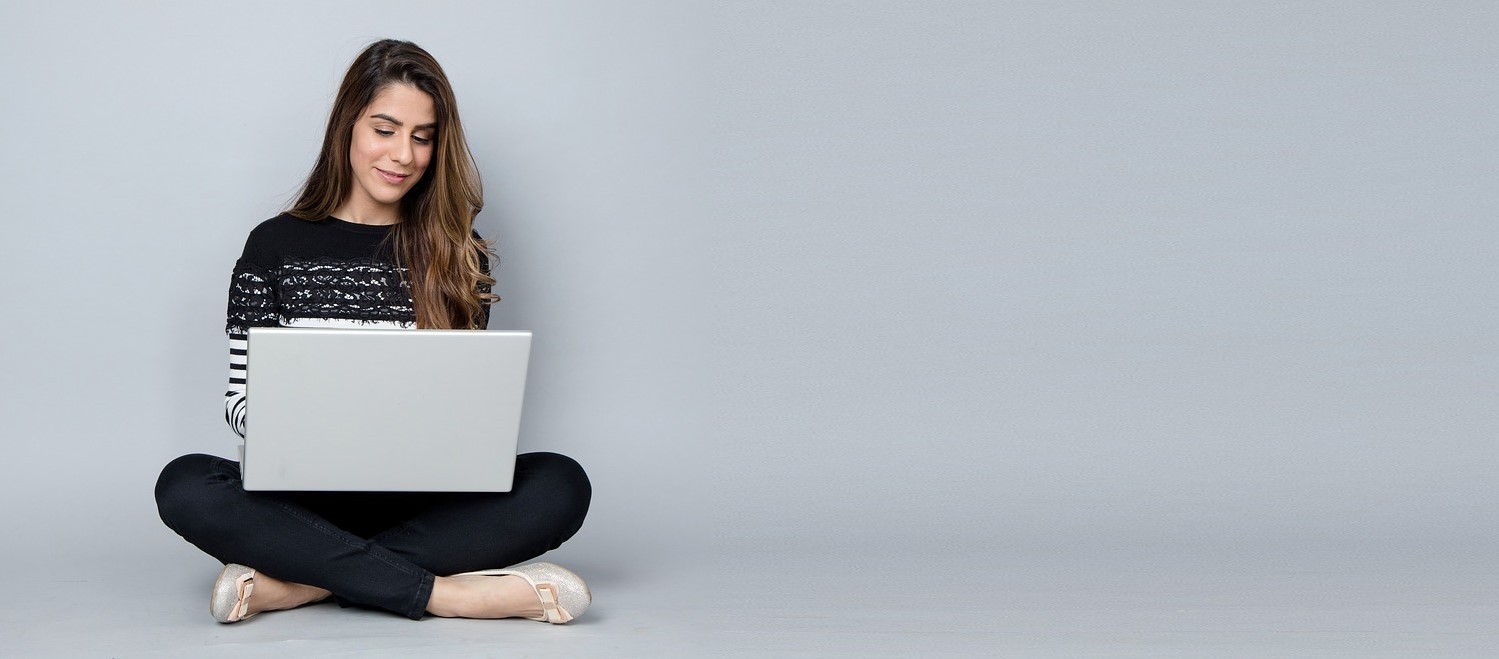 Woman thoughtfully considering career options, symbolizing the benefit of a christian career assessment tool in providing clarity and direction.